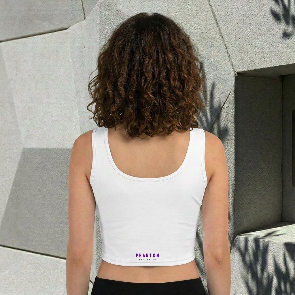 Person wearing a white tank top with 'Phantom' branding against a textured wall.