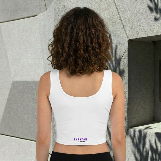 Person wearing a white tank top with 'Phantom' branding against a textured wall.